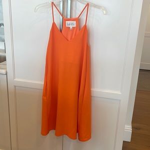 Nicole Miller tangerine dress with pockets. Size 6.